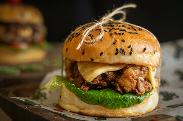 hamburger on a wooden plate