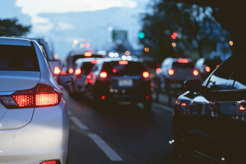 Fototapeta na wymiar traffic jam many cars stuck on road in evening time off working hours.