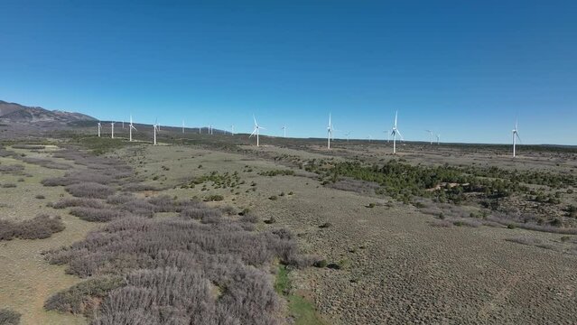 Aerial windmill farm southern Utah rural. Green energy generation and supply by wind power. Settled in July 1887 by pioneers from The Church of Jesus Christ of Latter-day Saints.