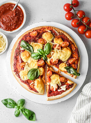 pizza with tomatoes and cheese