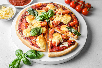 pizza with tomatoes and cheese