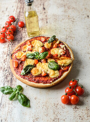 pizza with tomatoes and cheese