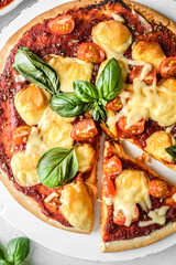pizza with tomatoes and cheese