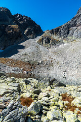 Highest part of Mala Studena dolina valley with Modre pleso lake and Sedielko mountain pass above in High Tatras mountains in Slovakia
