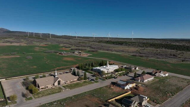 Aerial LDS Temple windmills Monticello Utah. Settled in July 1887 by pioneers from The Church of Jesus Christ of Latter-day Saints.