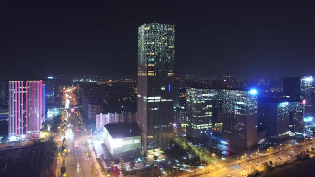 aerial view of modern building in midtown of jinhua at night
