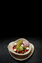 Fresh vegetable salad with cheese, on a plate