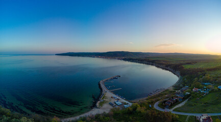 Fototapeta premium Panorama view from a height of the city of Sozopol with houses and boats near the Black Sea