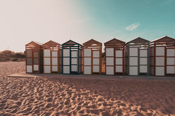 Famous beach huts in Sagaro with Playa de Sant Pol, Costa Brava. Spain. Mediterranean Sea