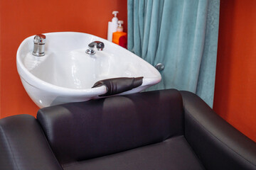 Interior view of luxury beauty salon. Empty sink in spa salon