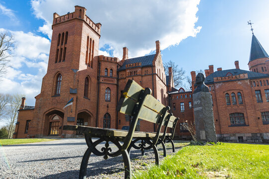 Sangaste Castle Estonia National Geographic yellow frame travel southern sunny heritage bench