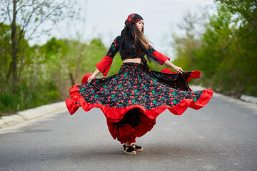 Gypsy girl dancing in the street