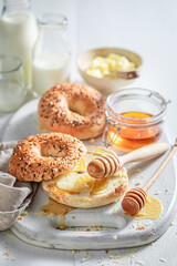 Obraz na płótnie Canvas Sweet and healthy golden bagels for tasty breakfast.