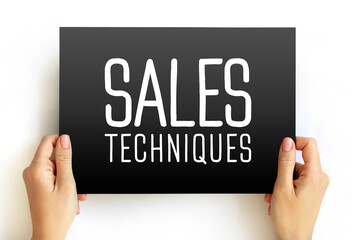 Sales Techniques text on card, concept background
