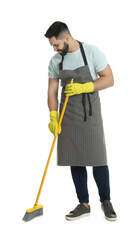 Young man with yellow broom on white background