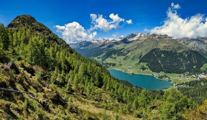 Fototapeta na wymiar Davos, View of the highest town in the Alps from mount Seehorn. Hiking spring .Beautiful mountain panorama in Graubunden. Switzerland