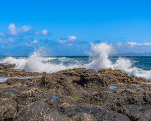 waves crashing on rocks