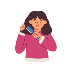 Little girl combes a hair with a hairbrush