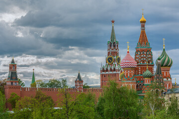 Fototapeta na wymiar Kremlin Tower and Cathedral of the Intercession of the Most Holy Theotokos on the Moat (St. Basil's Cathedral). Russia, travel