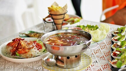 Tom Yum is a Thai curry that is sour and spicy.