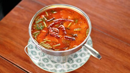 Tom Yum is a Thai curry that is sour and spicy.