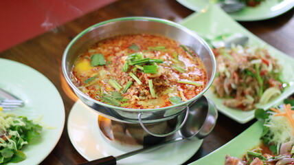 Tom Yum is a Thai curry that is sour and spicy.