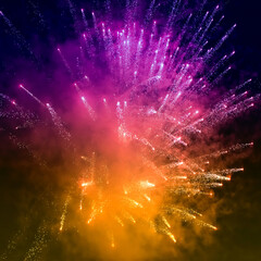 Colorful closeup fireworks light up the sky