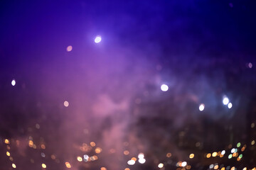 Fototapeta na wymiar Blurred colorful closeup fireworks light up the sky with beautiful bokeh.