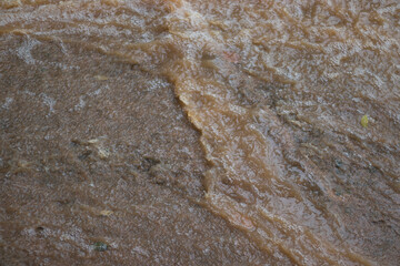 Shot landscape The waterfall after the rain is muddy.