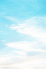 Vertical ratio size of sunset background. sky with soft and blur pastel colored clouds. gradient cloud on the beach resort. nature. sunrise.  peaceful morning. Instagram toned style