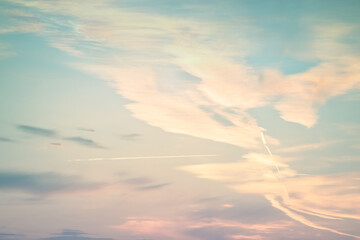 sunset background. sky with soft and blur pastel colored clouds.  gradient cloud on the beach resort. nature. sunrise.  peaceful morning. Instagram toned style