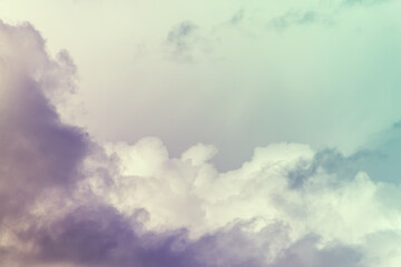 Twilight sky with effect of light pastel turquoise colors. Colorful sunset of soft clouds.