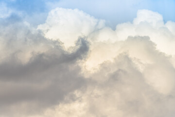 Twilight sky with effect of light pastel colors. Colorful sunset of soft clouds.
