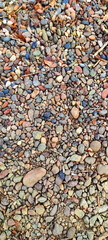Colorful stone texture. River Stone Background.