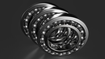 A set of three ball bearings of different diameters on a gray background. isolated. 3D Rendering.