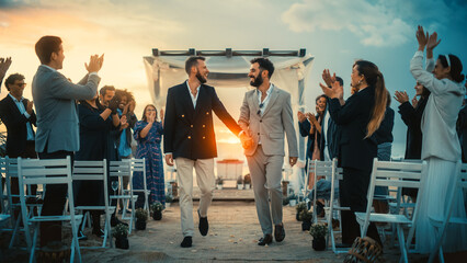Handsome Gay Couple Walking Up the Aisle at Outdoors Wedding Ceremony Venue Near Sea. Two Happy Men...