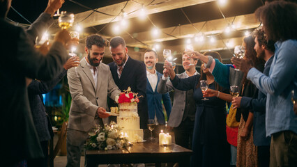Handsome Happy Gay Couple Celebrate Wedding at an Evening Reception Party with Diverse Multiethnic...