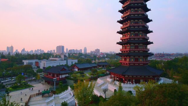 aerial view of wanfo old tower in midtown of jinhua at sunset
