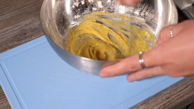 homemade fried fish in batter step by step. step cooking batter. mixing flour and eggs with a whisk.