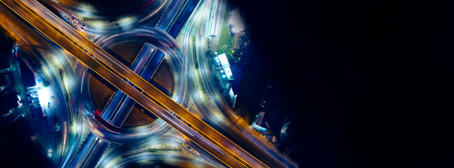 Aerial view of car traffic transportation above circle roundabout road of Drone aerial view fly ,...