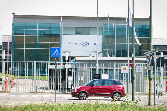 Mirafiori plant entrance in Turin with the Stellantis logo.  Turin, Italy -  April 2022