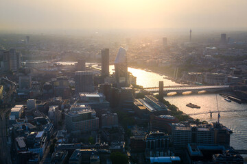 Fototapeta na wymiar City of London at sunset. View include modern skyscrapers, banks and office buildings, river Thames, London bridge.