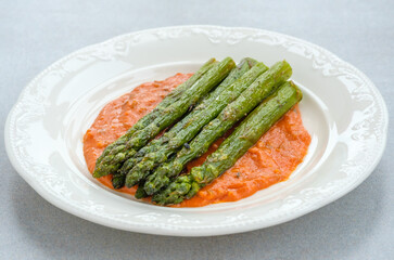 Fried asparagus with romesco sauce