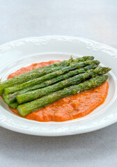 Fried asparagus with romesco sauce