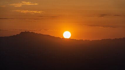 Sunrise on Santorini island over the town of Akrotiri