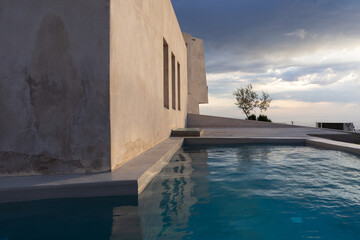 Modern lifestyle: Elegant concrete architecture with pool