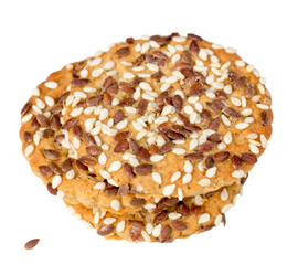 round cookies with sesame seeds and flax