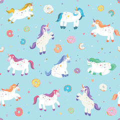 Unicorns with donuts vector seamless pattern