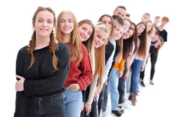 Obraz premium beautiful girl leader standing in front of her friends