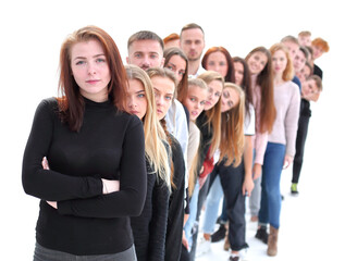 Obraz premium confident guy standing first in the column of young people
